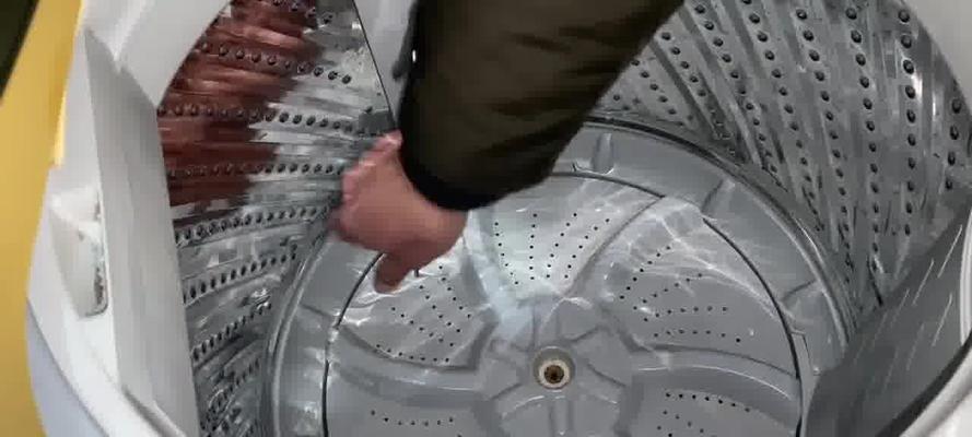 如何修理洗衣机水甩不干的问题（自己修理洗衣机水甩不干的方法与技巧）