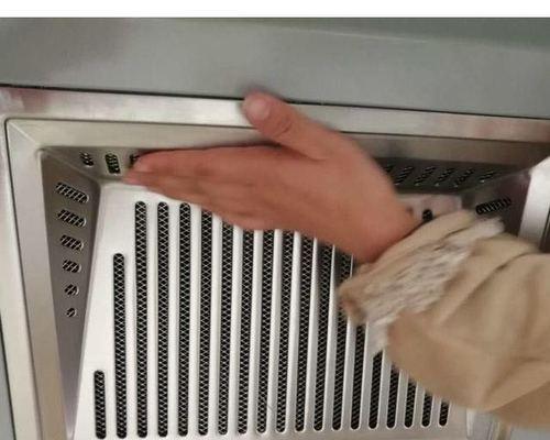 如何清洁和更换抽油烟机过滤器（简单方法让你的抽油烟机过滤器保持高效）